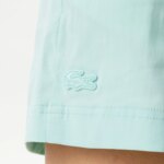 Женские короткие однотонные шорты Lacoste