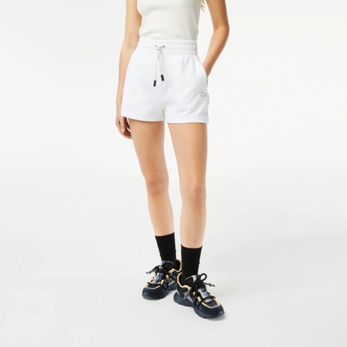 Женские однотонные шорты Lacoste